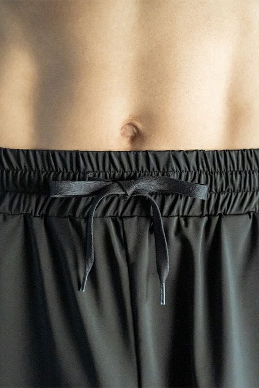美品！suria スリア ナイールズパンツ ブラック M メンズ】ダニエルロングパンツ | オンラインショップsuria ヨガ・ピラティス